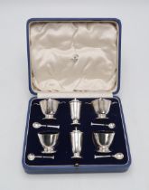 A CASED ART DECO SILVER SIX PIECE CRUET SET by Mappin & Webb, Birmingham 1937, comprising two