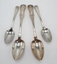 A PAIR OF WILLIAM IV SCOTTISH SILVER BASTING SPOONS by William Russell II, Glasgow 1831, in the