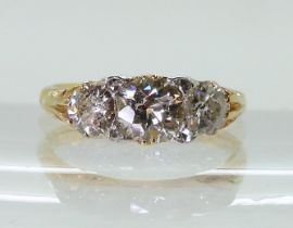 AN 18CT GOLD THREE STONE set with estimated approx 1.20cts of old cut diamonds, the claws are set