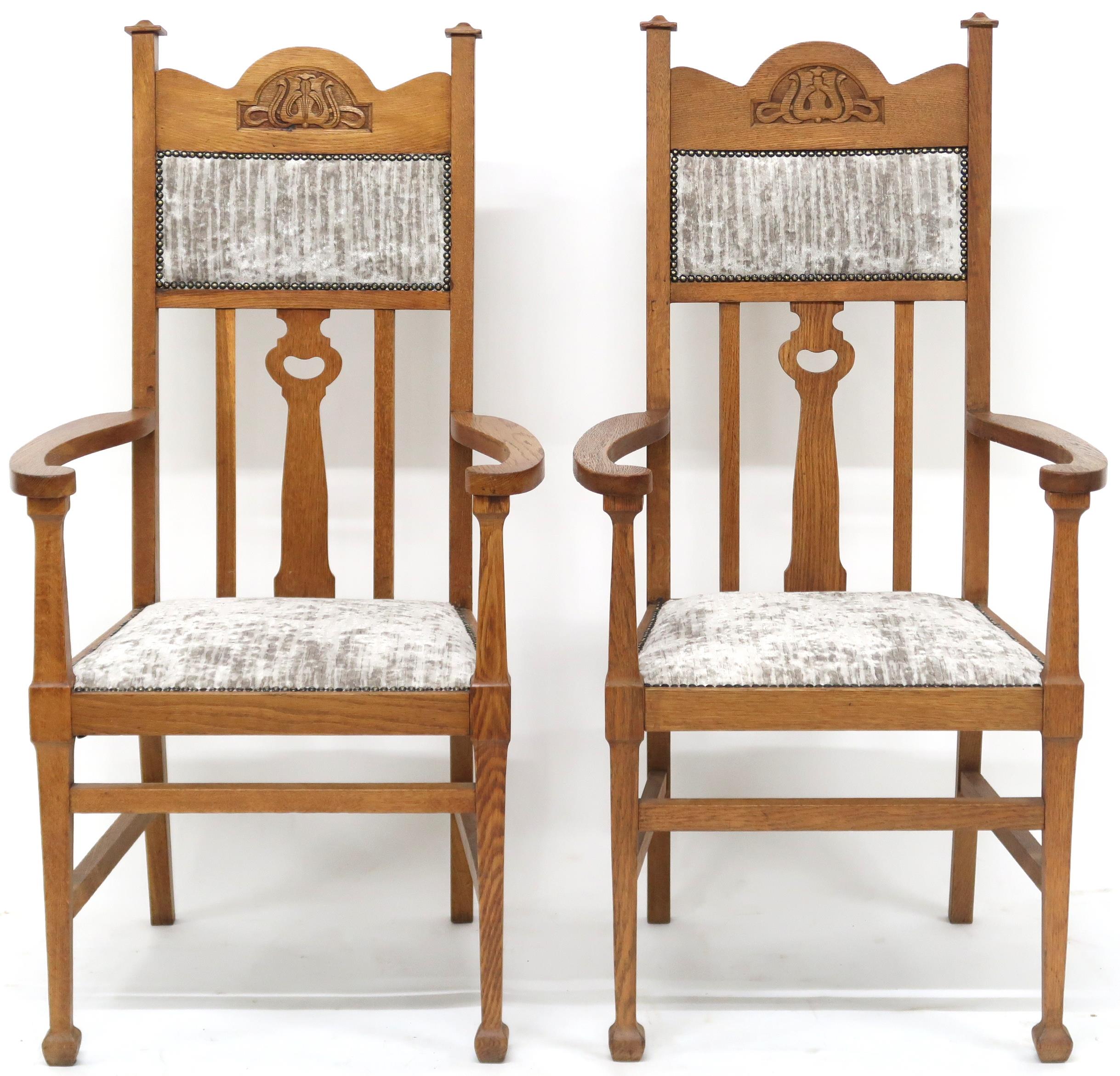 A PAIR OF LATE VICTORIAN OAK ARTS & CRAFTS OPEN ARMCHAIRS  with grey velvet upholstery on backrest
