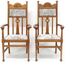 A PAIR OF LATE VICTORIAN OAK ARTS & CRAFTS OPEN ARMCHAIRS  with grey velvet upholstery on backrest