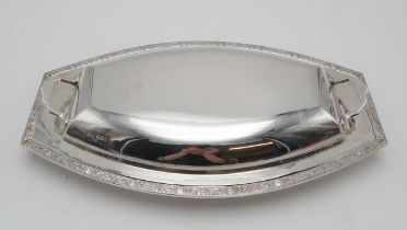 A GEORGE VI SILVER TUREEN AND COVER by S.G. Jacobs, Sheffield 1937, of shaped oval form, with celtic