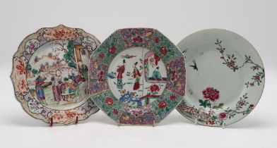 A CHINESE FAMILLE ROSE EXPORT OCTAGONAL PLATE  Painted with three figures within elaborate foliate