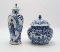 A CHINESE BLUE AND WHITE BALUSTER VASE AND COVER  painted with figures in panels within scrolling