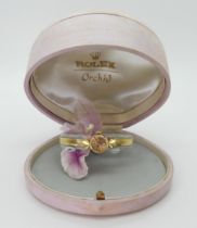 AN 18CT GOLD LADIES ROLEX ORCHID the gold coloured dial with gold baton numerals and hands, is