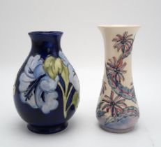 A MOORCROFT COLLECTORS CLUB VASE in daisy pattern designed by Sally Tuffin circa 1988, 21cm high,