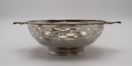 A GEORGE V SILVER QUAICH-FORM BOWL by Alexander Scott, Sheffield 1921, with lattice-type openwork to