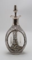A CHINESE EXPORT SILVER OVERLAID DIMPLE DECANTER stamped Sterling and with maker's mark, the 'Haig