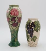 TWO MOORCROFT COLLECTORS CLUB PIECES including a Sweet Pea vase, 27.5cm high together with a