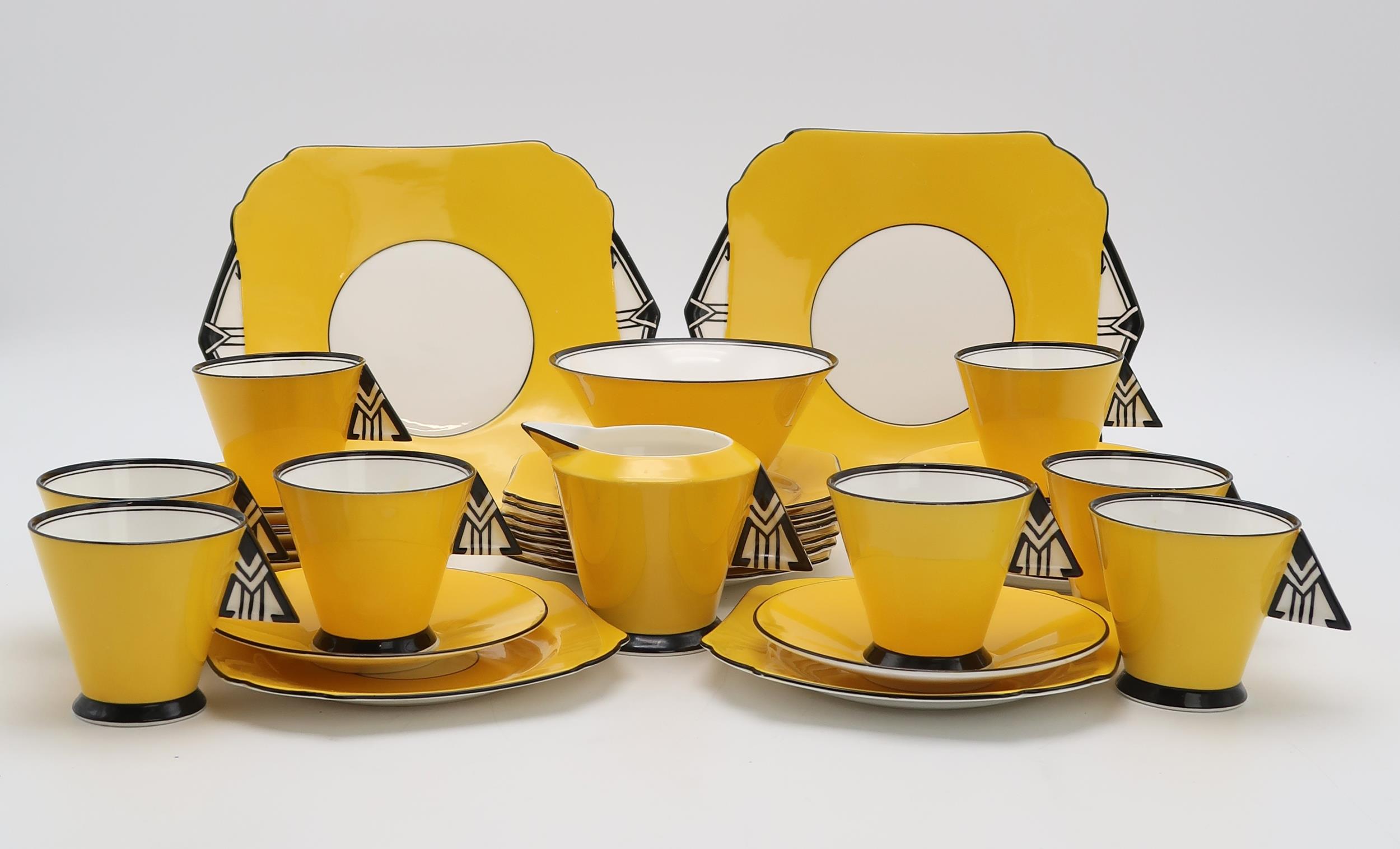 ERIC SLATER FOR SHELLEY - A PORCELAIN 1930'S TEA SERVICE in the Vogue shape decorated in the '