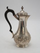 AN EDWARDIAN SILVER COFFEE POT by Charles Edwards, London 1902, of slender baluster form, with