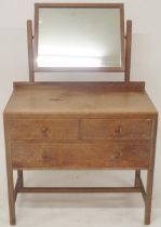 AN EARLY 20TH CENTURY LIMED OAK HEALS, LONDON DRESSING TABLE  with adjustable dressing mirror over