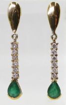 EMERALD & DIAMOND EARRINGS mounted in 18k gold, with two pear shaped emeralds of approx 7mm x 5mm