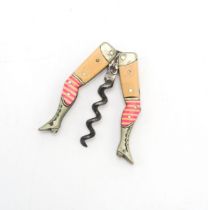 A GERMAN NOVELTY "LADY'S LEGS" CORKSCREW Circa-1900, the lady wearing pink and white stripey