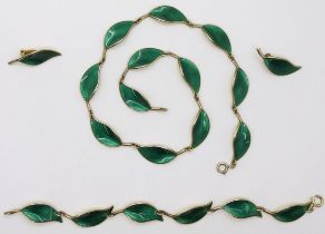 A DAVID ANDERSEN SUITE his classic enamelled green leaf design in silver gilt, designed by Willy