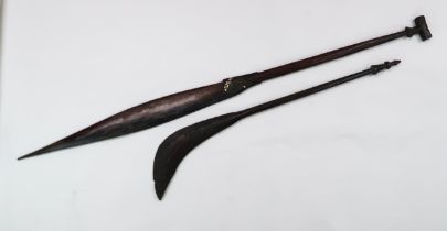 A POLYNESIAN FISH PADDLE Inset with abalone shell, 156cm long and a Polynesian club carved with