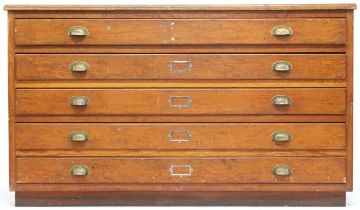 A 20TH CENTURY PITCH PINE PLAN CHEST  with five drawers on plinth base, 87cm high x 150cm wide x