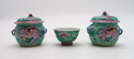 TWO CHINESE MINIATURE JARS AND COVERS  each painted with birds and flowers,with peach finials, 6.5cm