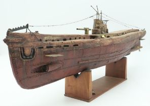 TOM MCKENDRICK RSW RGI (SCOTTISH B.1948) U-BOAT II Ceramic and copper, 87cm long (34.25") Exhibited: