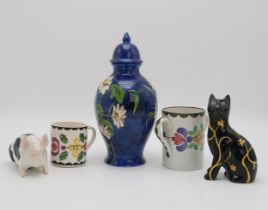 A COLLECTION OF GRISELDA HILL POTTERY including a limited edition black cat painted with