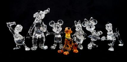 SEVEN SWAROVSKI CRYSTAL WALT DISNEY CHARACTERS including Mickey Mouse, Minnie Mouse, Donald Duck,