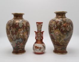 A PAIR OF SATSUMA BALUSTER VASES  Painted with Kannon and immortal figures amongst a dragon and