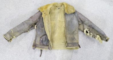 A WW2 period sheepskin flying jacket, in relic condition Condition Report:Available upon request