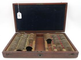 A cased set of optometrist's lenses, measuring approx.39cm wide x 22cm deep Condition Report: