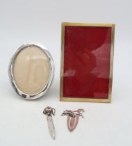 A collection of silver including a novelty silver bookmark, by James Fenton, Birmingham 1928, in the