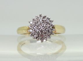 A 9ct gold diamond cluster ring, set with estimated approx 0.20cts of brilliant cut diamonds, finger