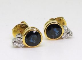 A pair of bright yellow sapphire and diamond earrings, (the butterflies stamped 750) the round