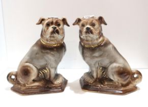 A pair of Bo'ness pottery pugs with glass eyes Condition Report:Available upon request