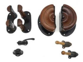 An assortment of wood and iron hooks/hangers, possibly for horse tack Condition Report:Available