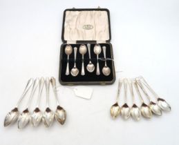 A collection of flatware including five silver grapefruit spoons, by Thomas Bradbury & Sons,