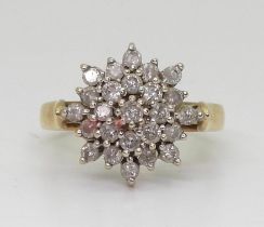 A 9ct gold diamond snowflake ring, set with estimated approx 0.96cts of brilliant cut diamonds,