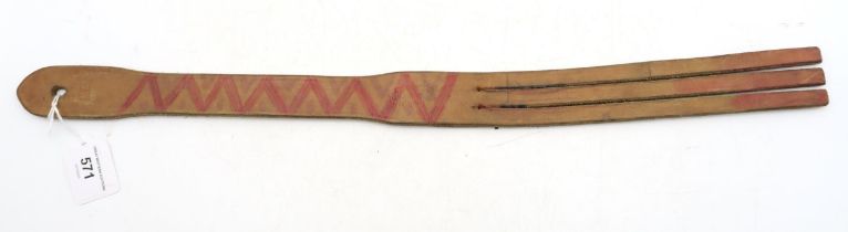 A heavyweight school tawse by John J. Dick of Lochgelly, of supple tan leather with three tails