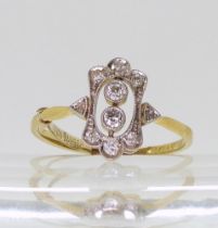 An 18ct gold vintage diamond cluster ring, set with estimated approx 0.20cts of old, eight and
