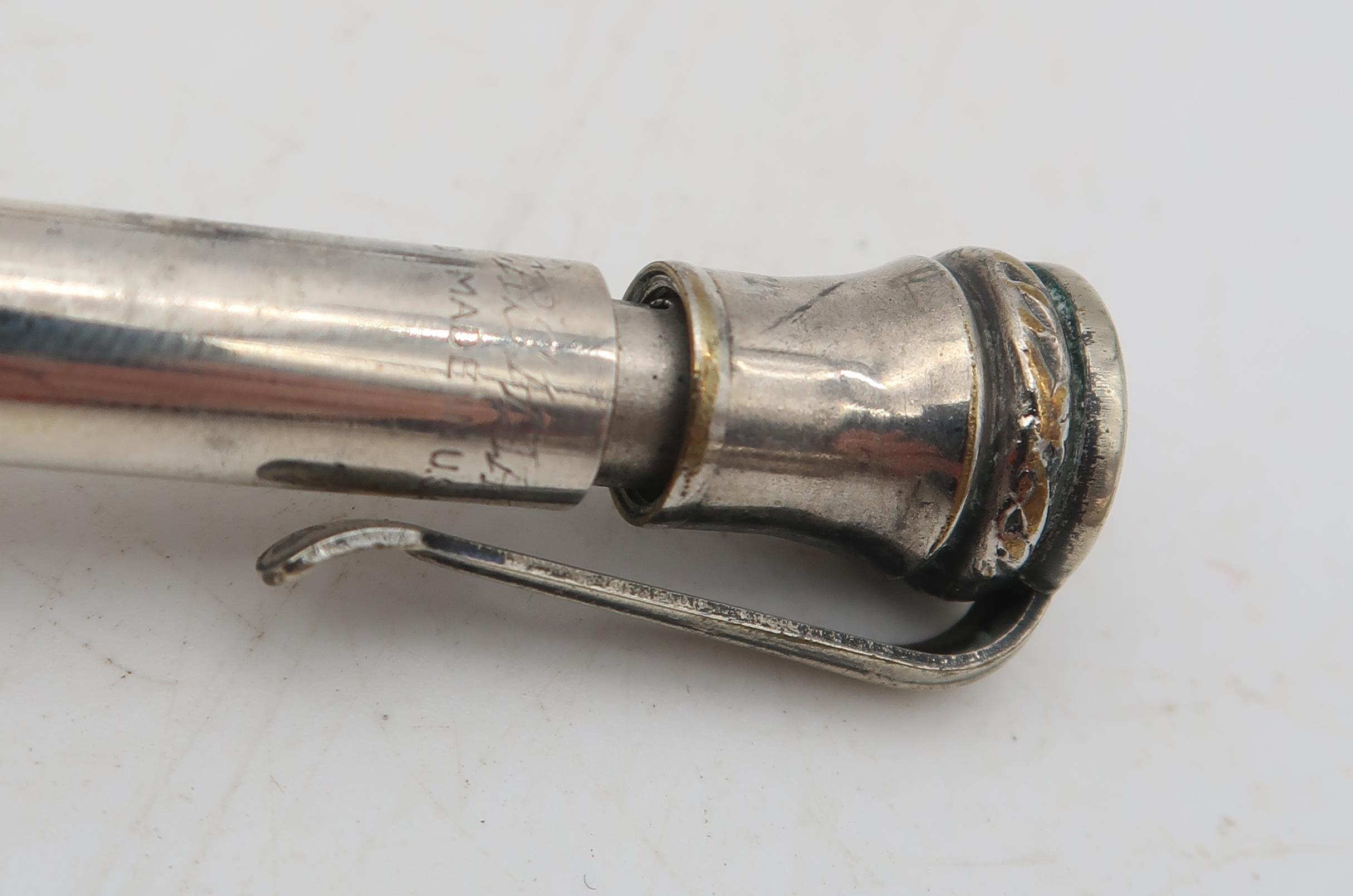 A collection of silver and white metal including an extending cheroot holder, with Art Deco banded - Image 2 of 3