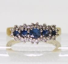 A 9ct gold sapphire and diamond cluster ring, finger size O, weight 3.7gms Condition Report: