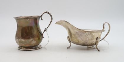 A George V silver christening mug, by Charles Edwards, London 1923, of baluster form, with a rat