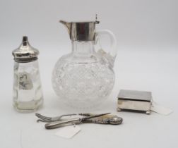 A collection of silver including a silver mounted cut crystal claret jug, by William Hutton &