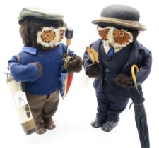 Two anthropomorphic owls by the London Owl Company: the Stockbroker and the Golfer, each standing