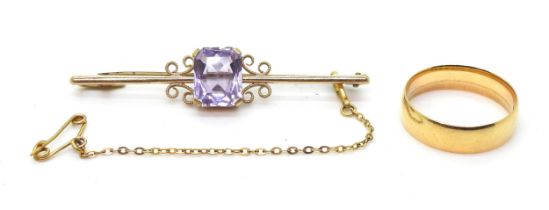 An 18ct gold wedding ring, size P, weight 3.6gms, together with a 9ct gold amethyst brooch weight