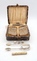 A cased set of silver clothes brushes, by Davis, Moss & Co, Birmingham, with engine-turned