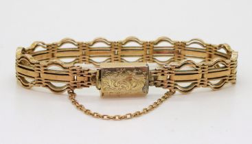 A yellow metal gate bracelet with attached yellow metal box clasp, length 18cm, weight 19.5gms