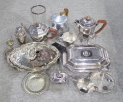 A collection of EPNS including a four piece tea set, tureens, casters, dishes, chamber sticks etc