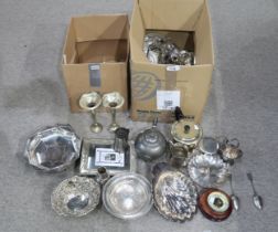 A collection of EPNS including specimen vases, casters, scalop dishes, photo frames, tea pots etc