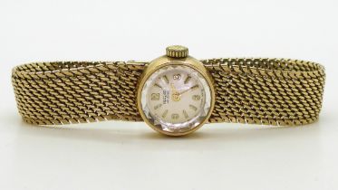 A ladies 9ct gold Record De Luxe, length 16.5cm, diameter of the case 16mm, weight including