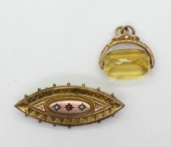 A 9ct mounted citrine fob seal, together with a red gem and pearl brooch, weight together 12gms