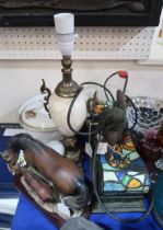 A Egyptian inspired leaded glass lamp, a resin horse group and a French casserole dish and a onyx